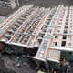 Illustration for article titled Entire New 13-Story Building Tips Over in Shanghai